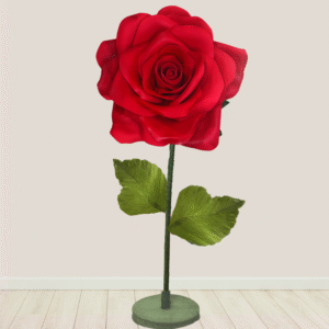 Big large red eva foam rose on long green stem with leaves. Great addition for photography shoots